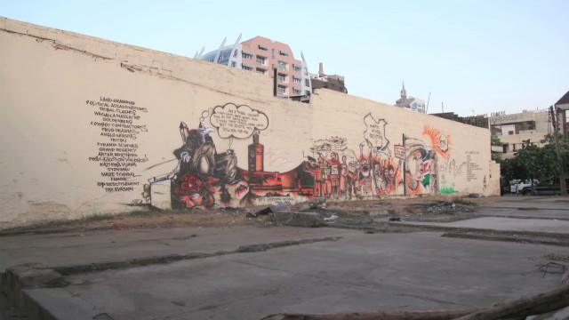 Graffiti painters create anti-graft art