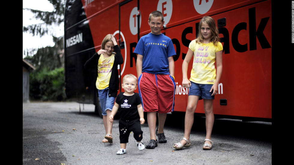 Armstrong&#39;s son Luke; his twin daughters, Isabelle and Grace; and his 1-year-old son, Max, stand outside the Radio Shack team bus on a rest day during the 2010 Tour de France.