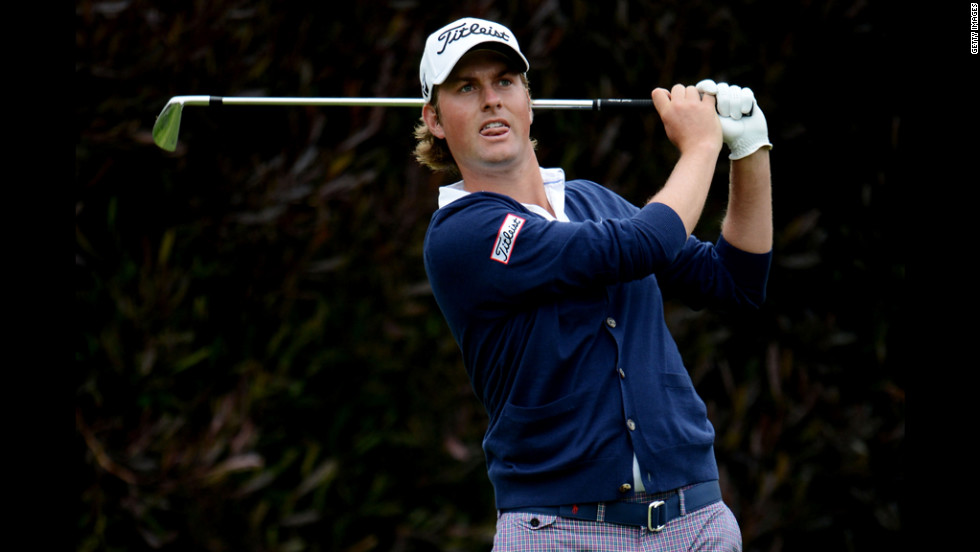 Webb Simpson hits his tee shot on the 13th hole of the 112th U.S. Open.