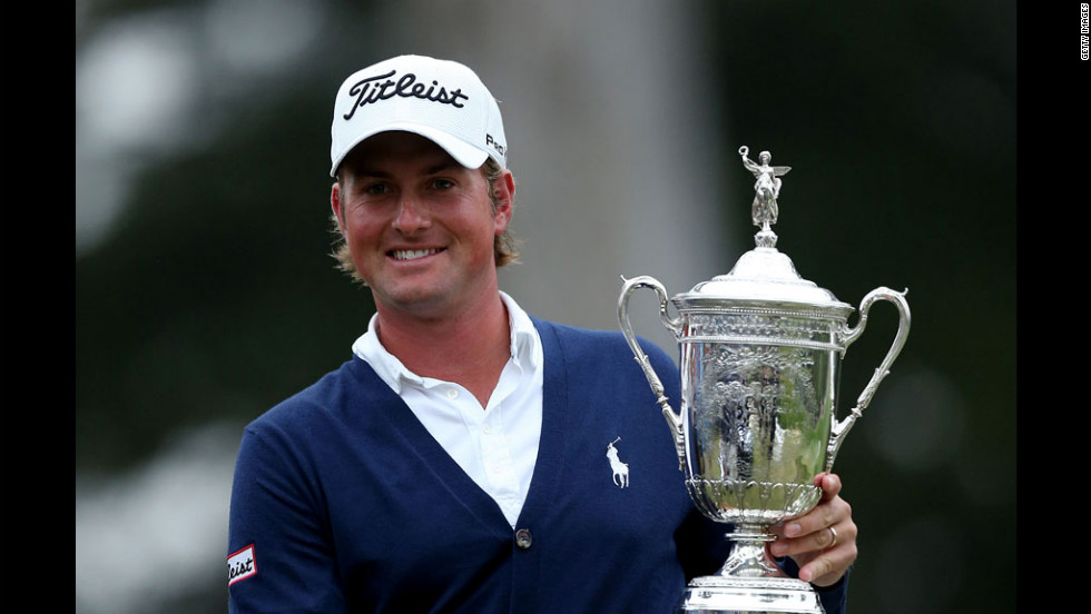 Webb Simpson of the United States holds the U.S. Open trophy after his one-stroke victory in San Francisco on Sunday, June 17. Simpson finished the four-day event at one shot over par to secure his first major title.