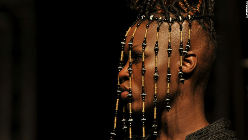 African designers presented their creations during the 10th annual Dakar Fashion Week in the Senegal capital.  Here, a model displays a tribal-inspired head piece by Moroccan designer Jamila Lafqir. 