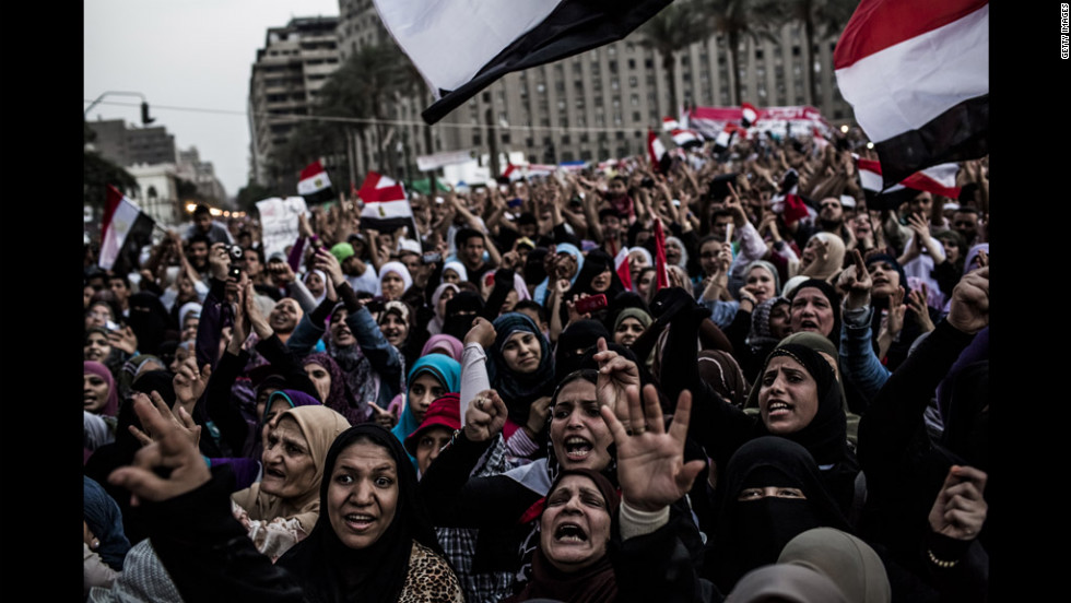 Female supporters of Mohamed Morsi, the Muslim Brotherhood&#39;s candidate, protest against Egypt&#39;s military rulers in Tahrir Square in Cairo on Saturday, June 23. Egyptian election officials had postponed the announcement of a winner in last weekend&#39;s presidential runoff, stating they needed more time to evaluate charges of electoral abuse that could affect who becomes the country&#39;s next president.