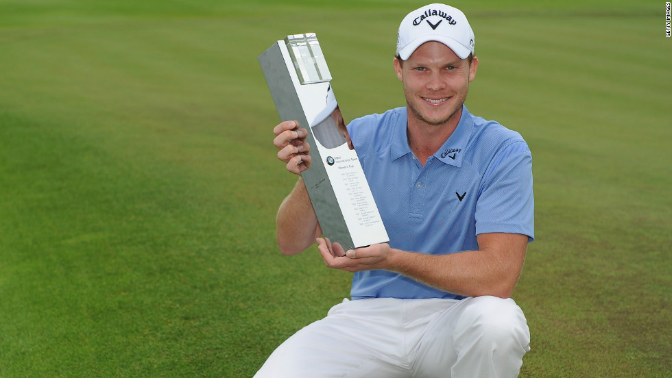 European Tour star Danny Willett, pictured with the BMW International Open trophy in Cologne.