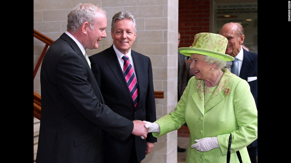 An historic moment was made when &lt;a href=&quot;http://edition.cnn.com/2012/06/26/world/europe/northern-ireland-mcguinness-queen-handshake/&quot;&gt;Queen Elizabeth II&lt;/a&gt; shook  hands with Northern Ireland Deputy First Minister Martin McGuinness as First Minister Peter Robinson looks on at the Lyric Theatre in Belfast, Northern Ireland, on June 27, 2012. A simple handshake marks a step forward in the peace process relating to British rule of Northern Ireland. 