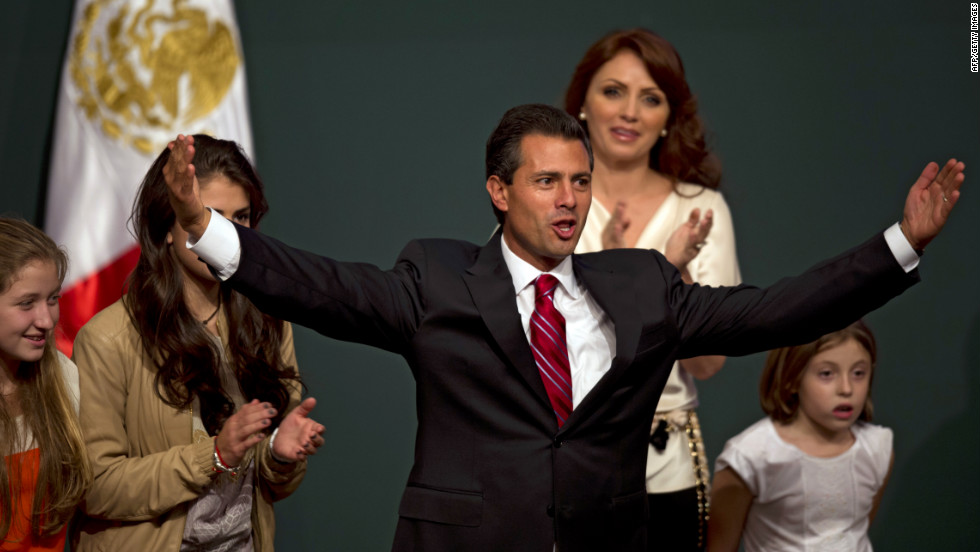 Peña Nieto celebrates with his family after projections declared him the apparent victor in Mexico&#39;s presidential election on Sunday, July 1.