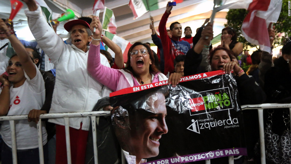 Peña Nieto&#39;s supporters cheer during the victory speech in Mexico City on Sunday. The results would mean a return to power for a party that ruled Mexico for more than 70 years.