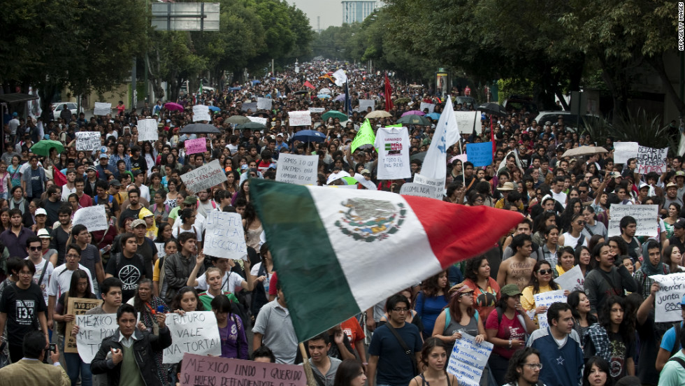 Thousands of protesters take to the streets in Mexico City on Monday, a day after the presidential election results were announced. Supporters of the opposition candidate were rallying against Enrique Peña Nieto, who declared victory late Sunday.