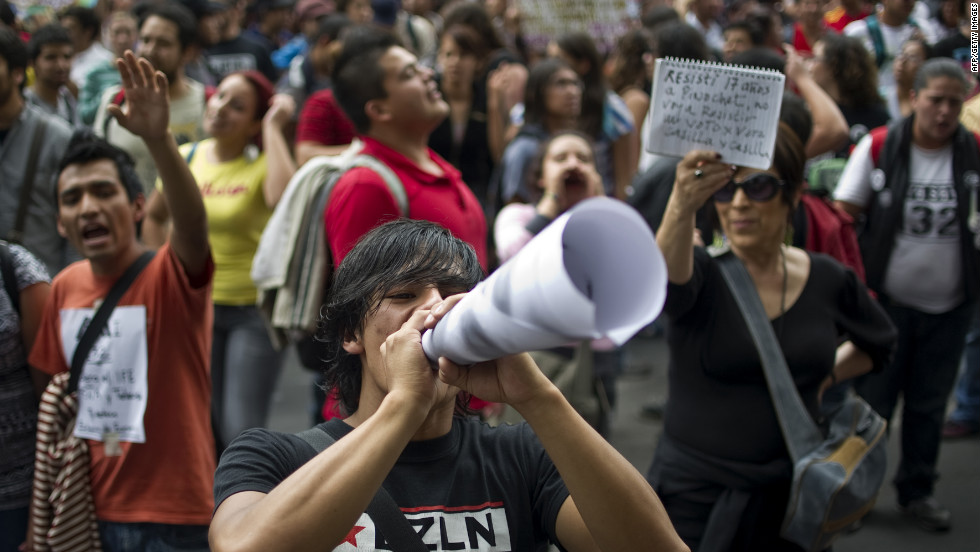 Members of the &quot;I Am 132&quot; movement protest on Monday. A video that was uploaded to YouTube helped launch the nationwide student movement, adding fuel to the political frenzy.