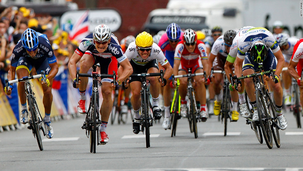 Andre Greipel, second from left, of the Lotto-Belisol team charges ahead to the finish line on Thursday to win Stage 5 of the Tour de France. 