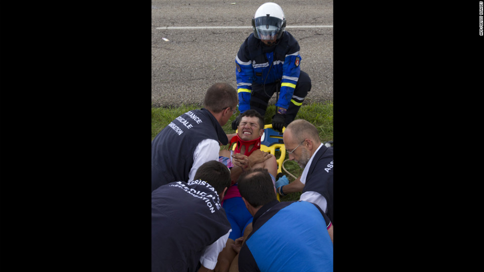 Italy&#39;s Davide Vigano is lifted on a stretcher after the crash on Friday, July 6.