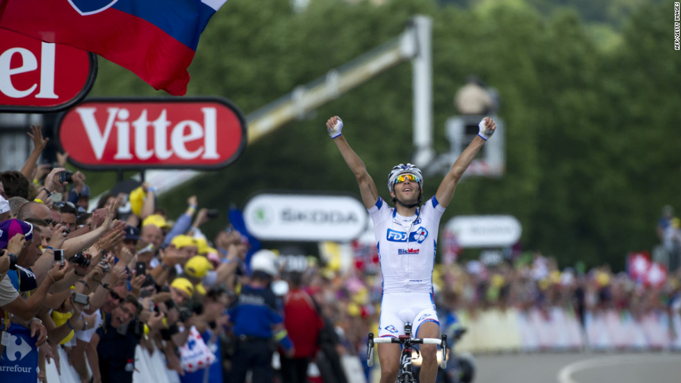 Thibaut Pinot of France celebrates on the finish line after winning Stage 8 of the Tour de France on Sunday, July 8. The stage covered 157.5 kilometers (98 miles) from Belfort, France, to Porrentruy, Switzerland, with seven major climbs.