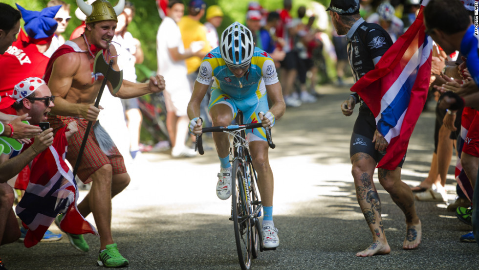 Fans cheer on Kessiakoff during the last major climb of the stage Sunday.