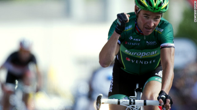 Thomas Voeckler crosses the line to win the 10th stage of the Tour de France.