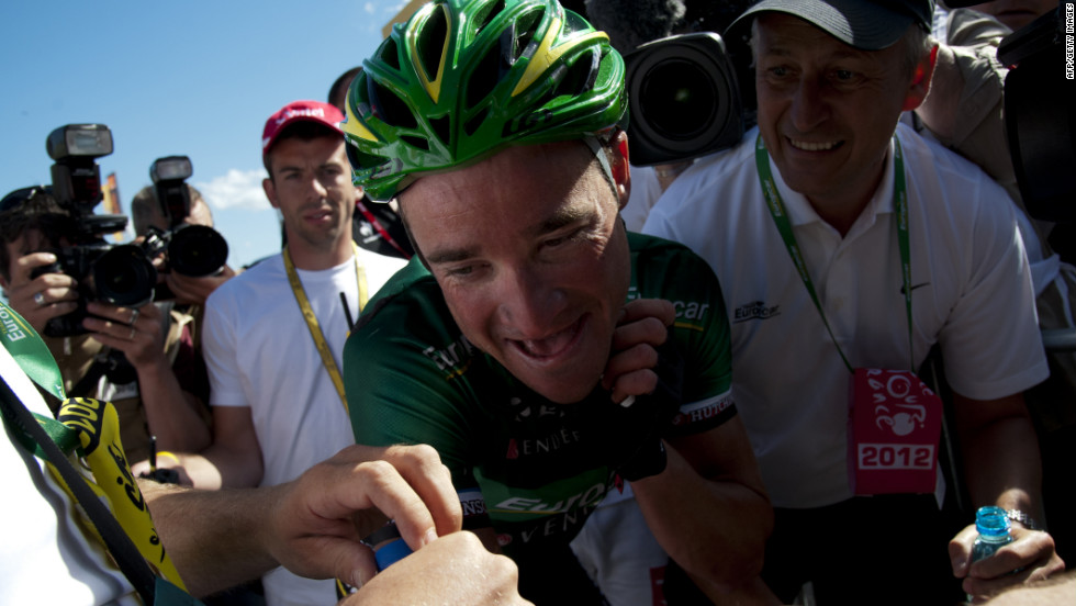 France&#39;s Thomas Voeckler celebrates after winning stage 10, a 194.5-kilometer (120-mile) course starting in Macon and finishing in Bellegarde-sur-Valserine, France, on Wednesday, July 11.