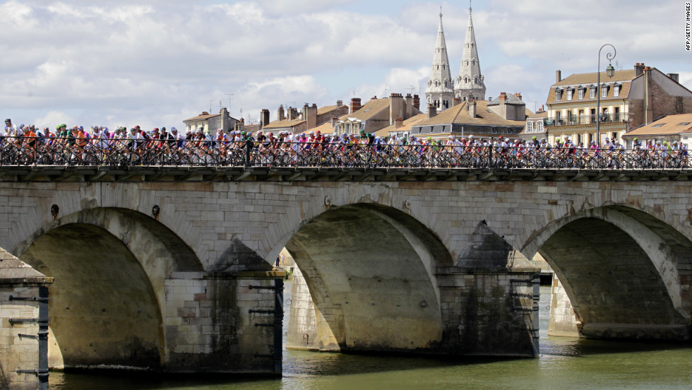 The cyclists cross a bridge in Macon at the beginning of Wednesday&#39;s events.