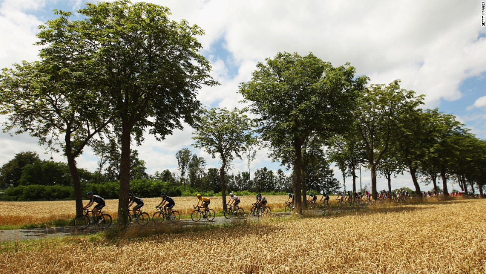 Race leader Bradley Wiggins of Great Britain rides through the French countryside in the main pack of riders Wednesday.