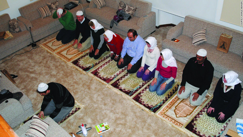 Tour participants are taught to pray in a private home in Istanbul.
