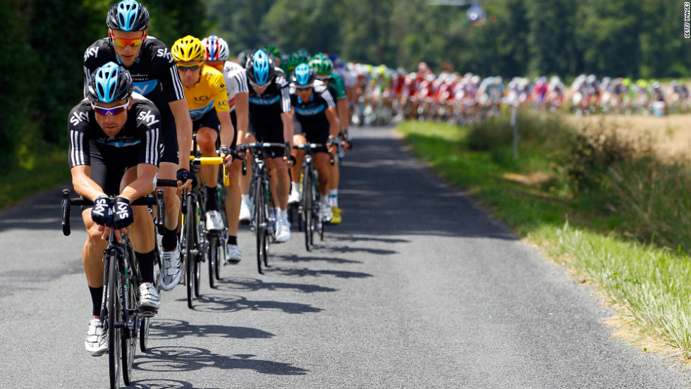 Bernhard Eisel of Austria and Team Sky drive the peloton as they work to defend Bradley Wiggins&#39; hold on the overall race lead Wednesday.