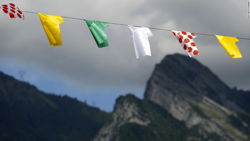 Representations of Tour de France leaders&#39; jerseys hang along the road during Thursday&#39;s race.