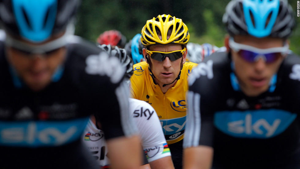 Bradley Wiggins of Great Britain, wearing the yellow jersey, maintains his position as the overall race leader, 2 minutes 5 seconds ahead of Team Sky teammate Christopher Froome, on Sunday.