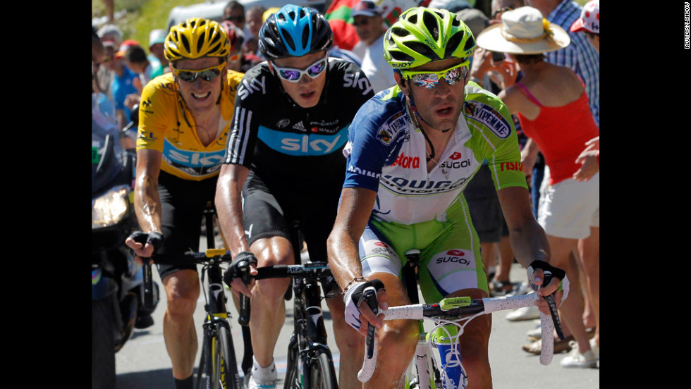 Bradley Wiggins, left, is in first place while Christopher Froome is in second and Vincenzo Nibali is in third place in the race to maintain their standings Wednesday.