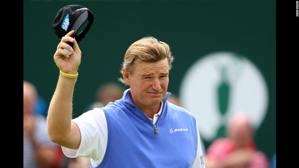 South African Ernie Els waves to the gallery on the 18th hole during the first round Thursday.