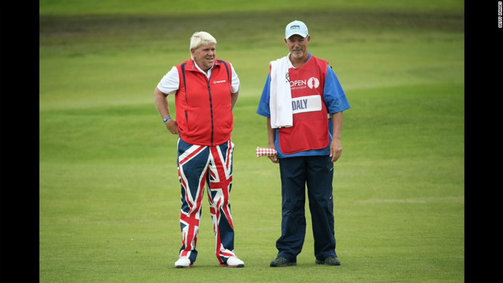 John Daly of the United States speaks with his caddy, Peter Van Der Riet, on the second fairway during Friday&#39;s second round.
