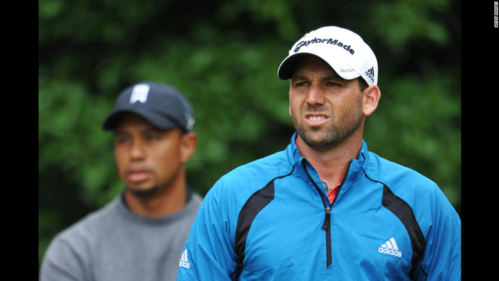 Sergio Garcia of Spain and Tiger Woods of the United States look on at the first tee during the second round Friday. 