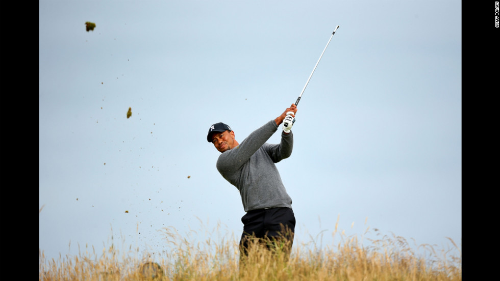 Tiger Woods of the United States tees off on the 11th hole Friday, July 20. 