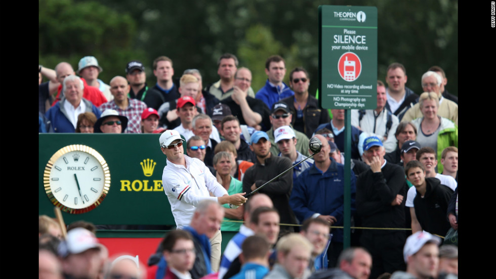 Zach Johnson of the United States watches his tee shot on the 14th hole during the second round Friday.