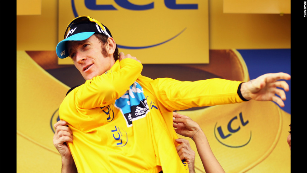 Bradley Wiggins of Great Britain and SKY Procycling retained his race leader&#39;s yellow jersey after Stage 18 on Friday.