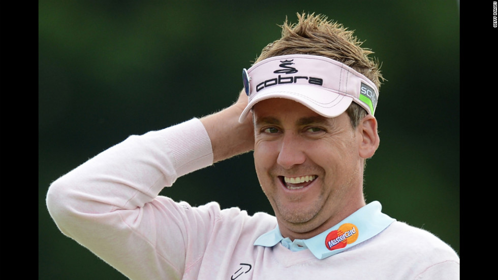 England&#39;s Ian Poulter walks off the 18th green during the second round on Friday.