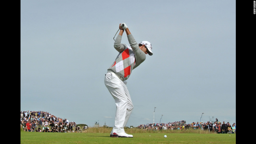 Adam Scott tees off on the fifth hole.