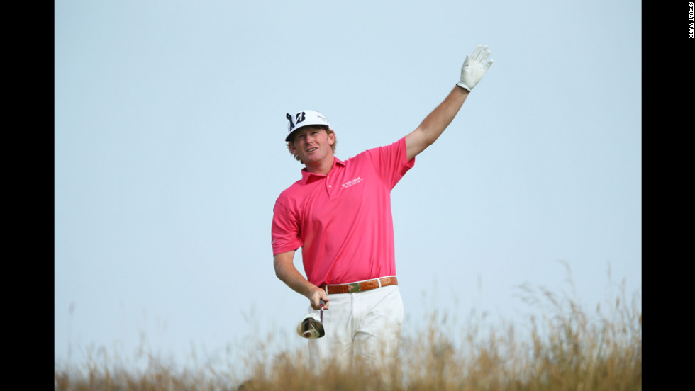 Snedeker reacts to a poor shot on the 11th hole.