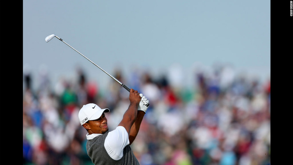 Tiger Woods hits his tee shot on the 17th hole on Saturday. 