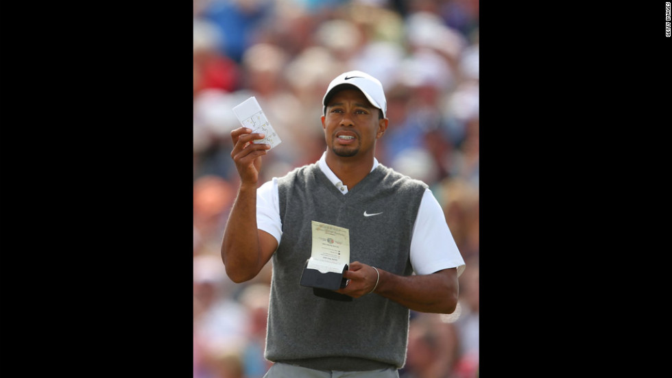 Tiger Woods makes some calculations before teeing off at No. 5.