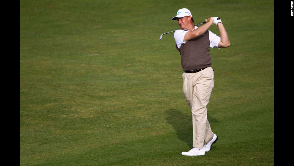 Ernie Els of South Africa hits an approach shot. Els, a three-time major champion, is tied for fifth place with American Zach Johnson, six shots out of the lead.