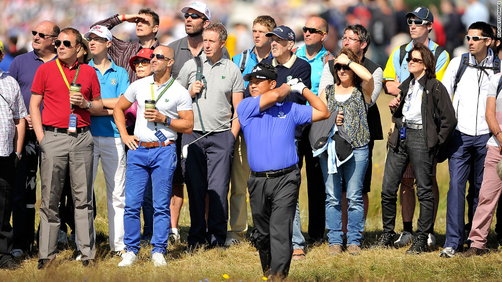 K.J. Choi of Korea plays a shot in front of the gallery.