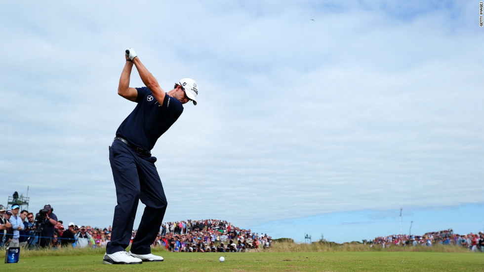 Overall leader Adam Scott of Australia hits his tee shot on the fifth hole Sunday.