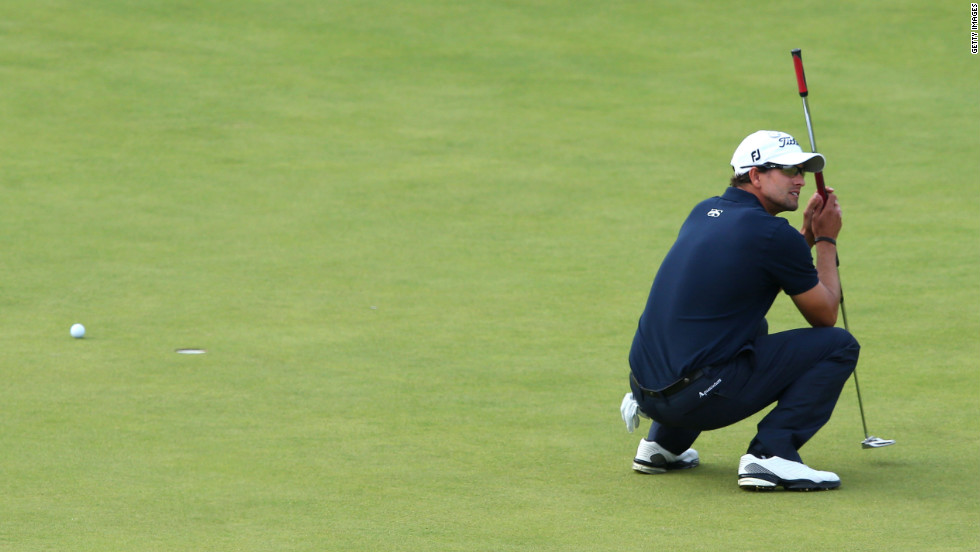 Adam Scott of Australia reacts to a missed par putt on the 18th green Sunday.