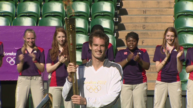 Andy Murray carries the Olympic torch 