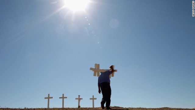 After mass tragedies, this carpenter builds crosses to help a nation grieve