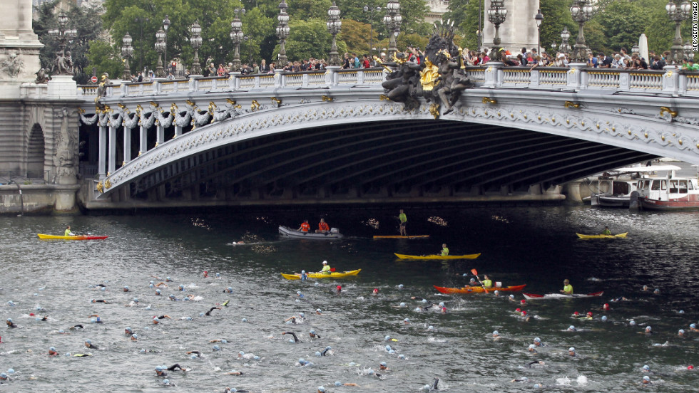 At the same 1900 Olympics, obstacle course swimmers had to negotiate boats and poles. Today the River Seine is more likely to accomodate triathletes in the city&#39;s annual competition.