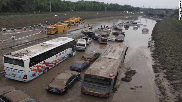 Could Beijing flood death toll rise? 