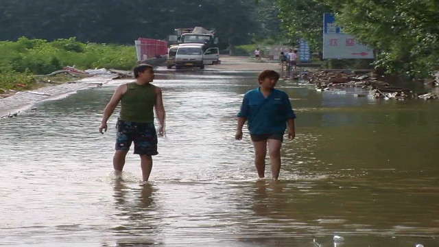 Why did water flood Beijing? 