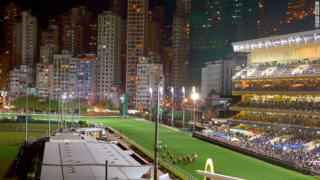 Happy Valley Racecourse is surrounded by giant apartments and skyscrapers.