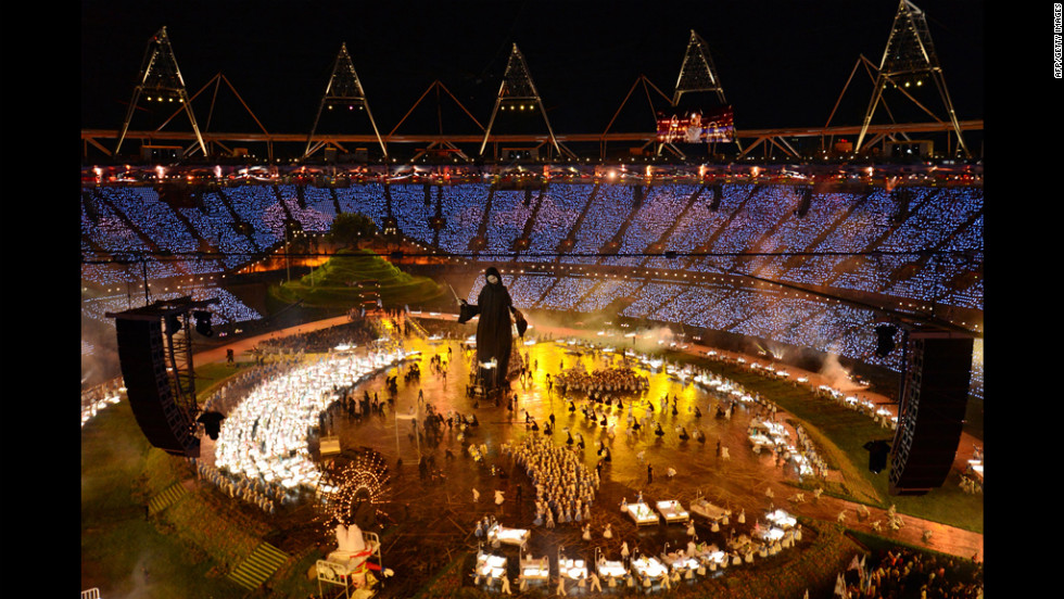 General view taken as actors perform during the opening ceremony.