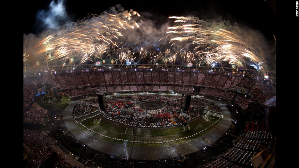 Fireworks explode from the stadium roof.