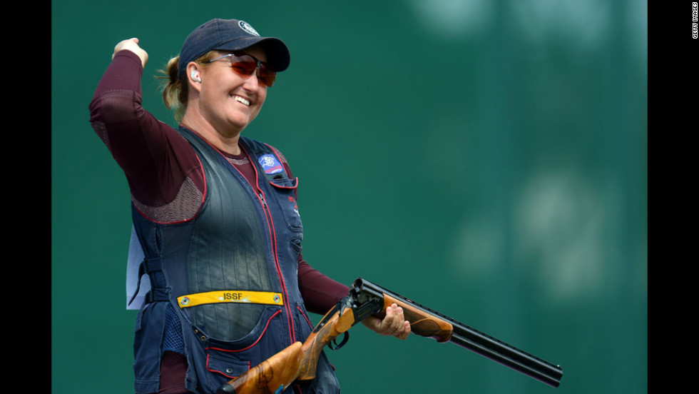 Rhode celebrates winning the skeet competition at the Royal Artillery Barracks. 