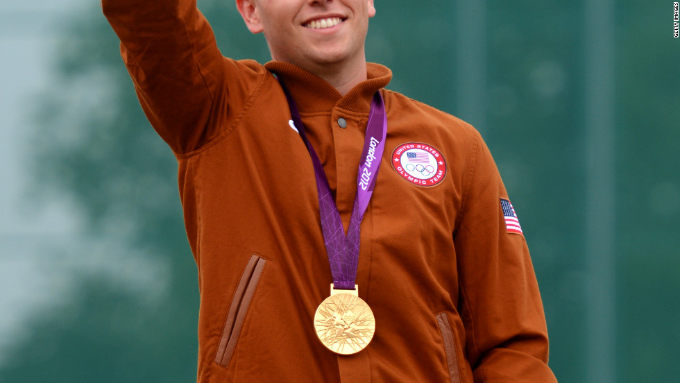 Vincent Hancock shows off his gold medal in men&#39;s skeet shooting Tuesday. 